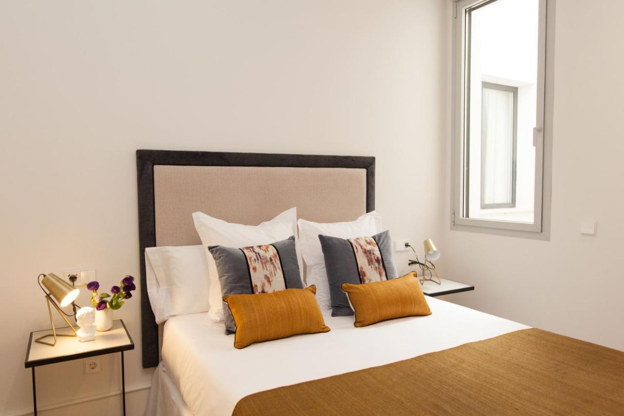 Isg Apartments Cedaceros Sevilla Kamer foto